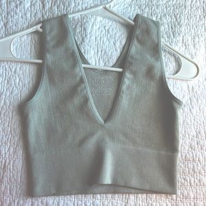 Crop top in Light Green. Size S